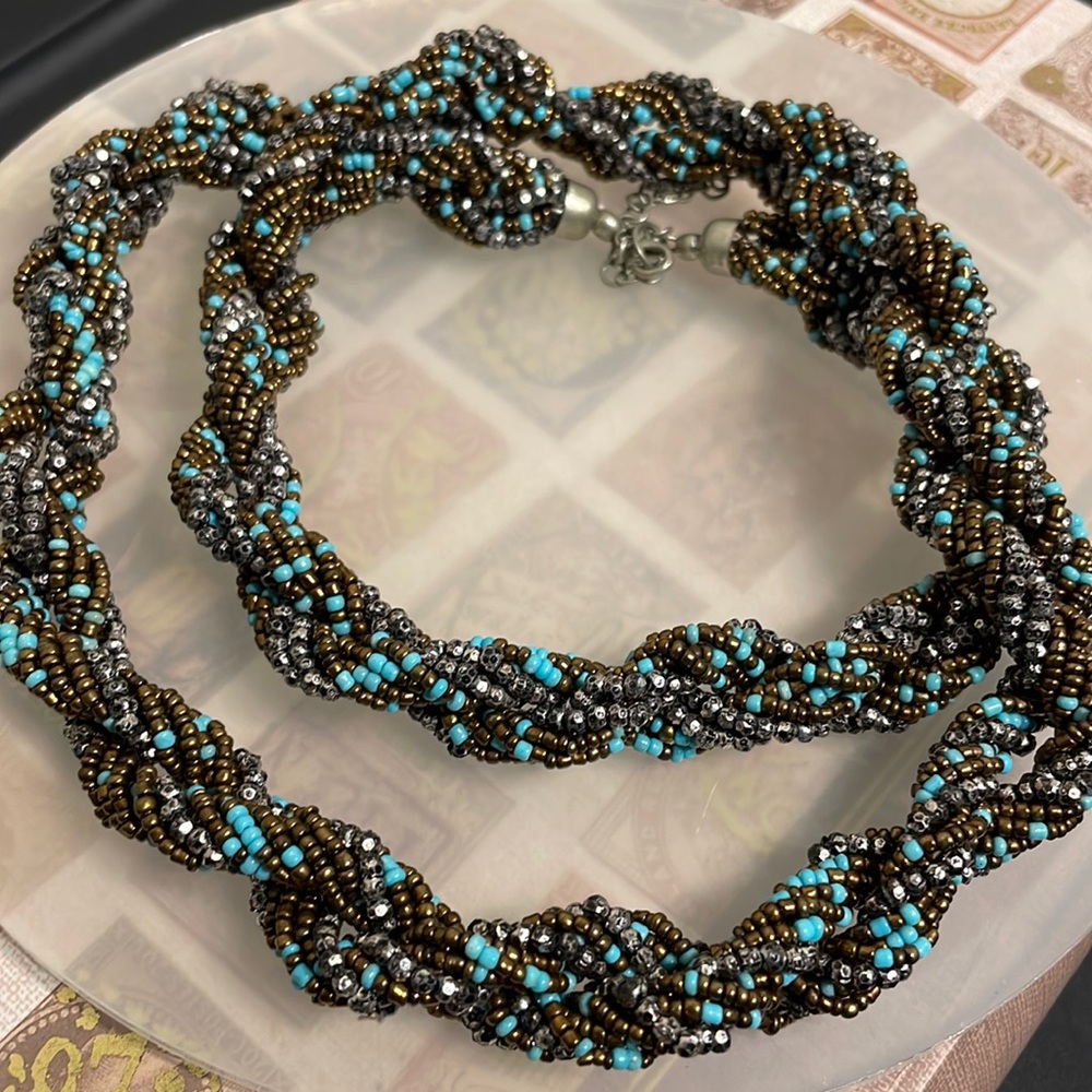 Long beaded brown and blue necklace